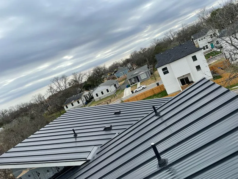 Standing seam metal roof panels with vents for Skylight Repair in Burke